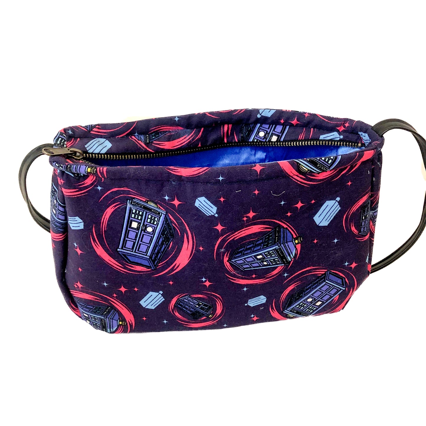 Front view of a fabric purse with a Dr Who TARDIS motif showing the interior satin fabric