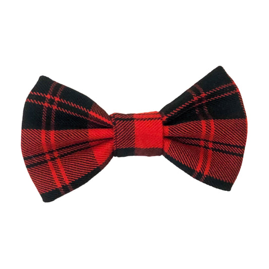 Photo of a hair bow made of red and black plaid material 