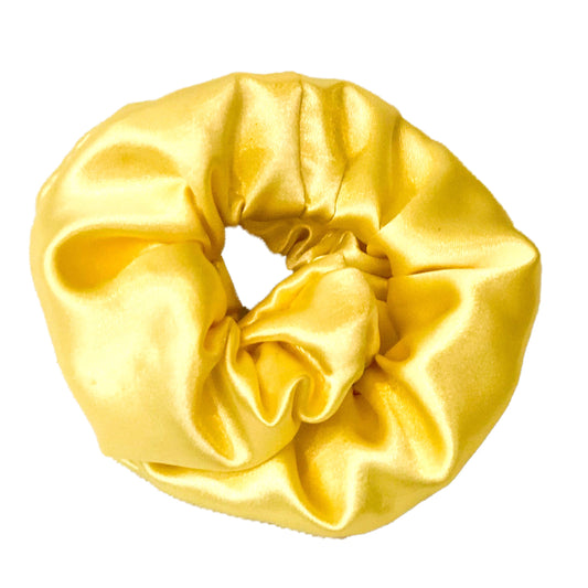 Photo of a scrunchie made of pale yellow satin