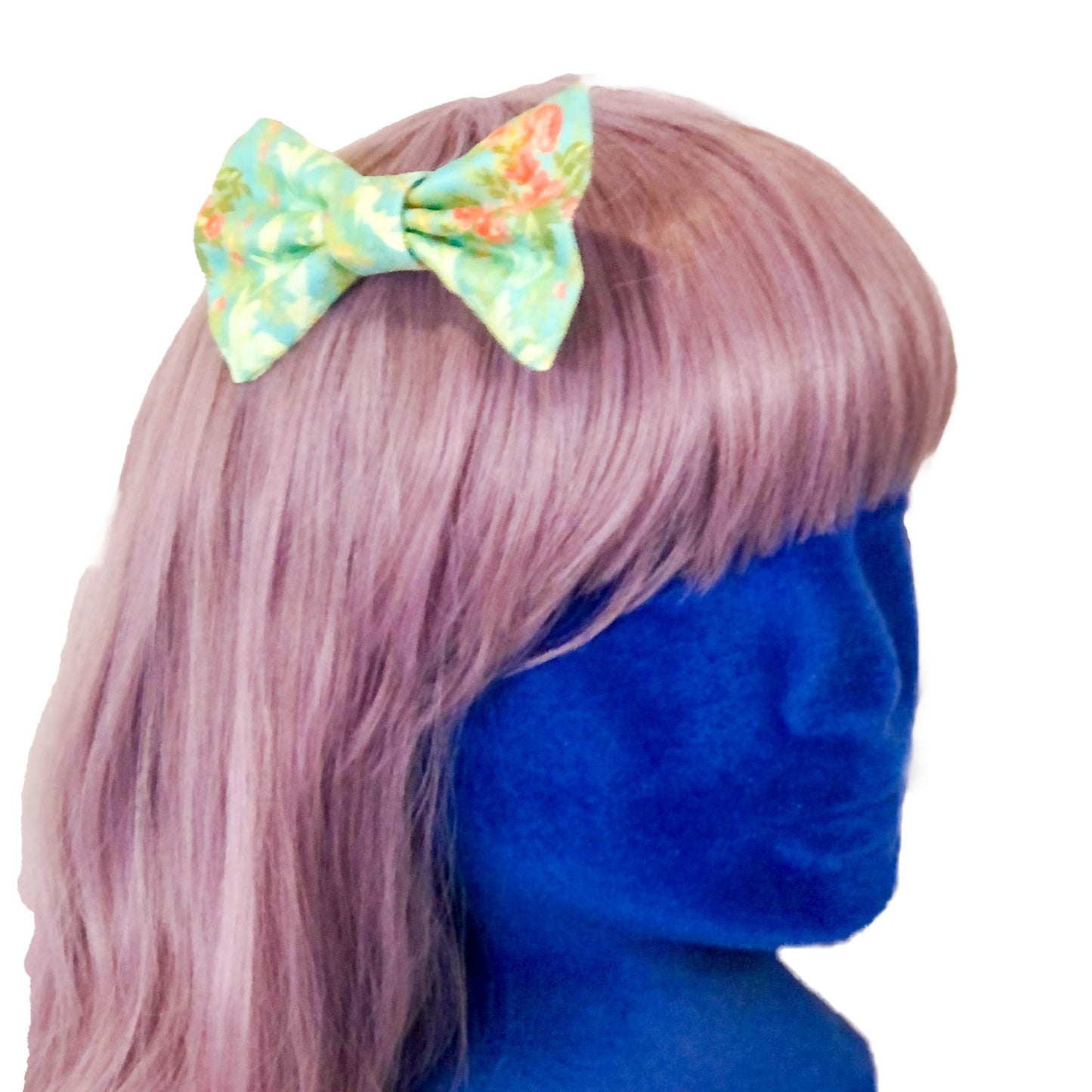 Bow made from chintz fabric on a wig